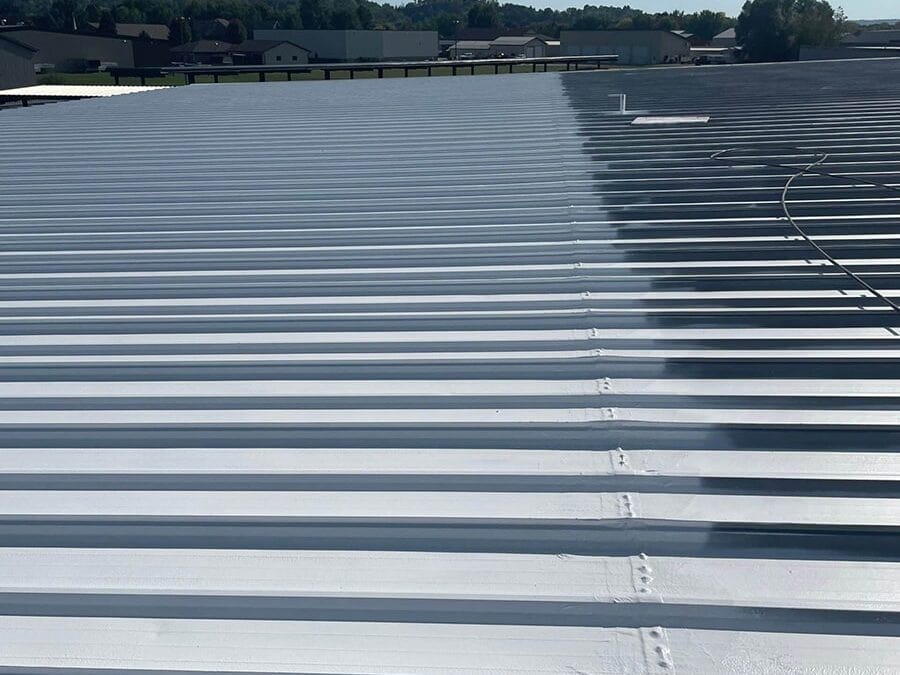 Hail damaged commercial metal roof