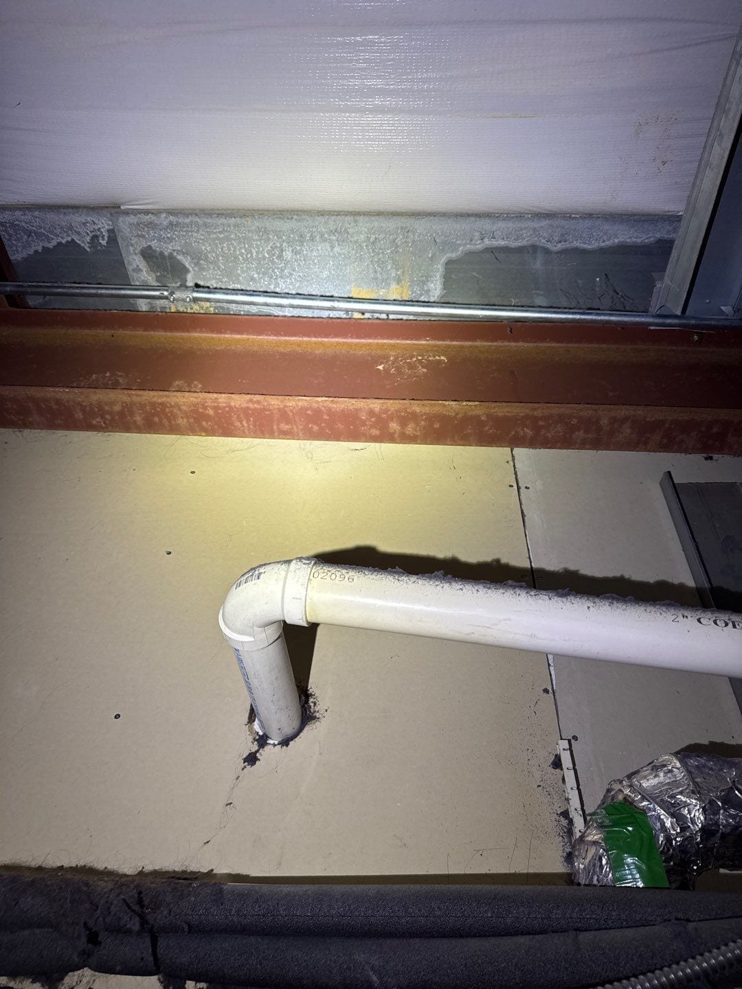 Condensation wearing away at the building’s metal structure